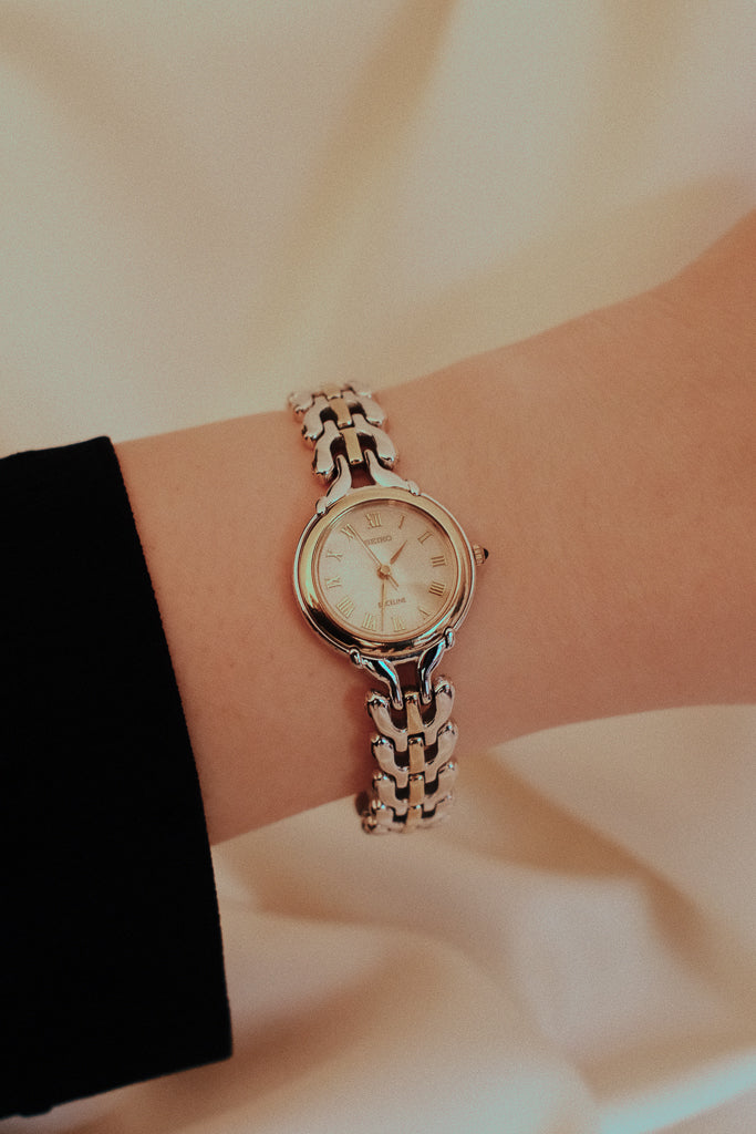 Vintage Seiko Exceline Ladies Silver Watch with Pearlescent Ivory Dial and Gold Accents