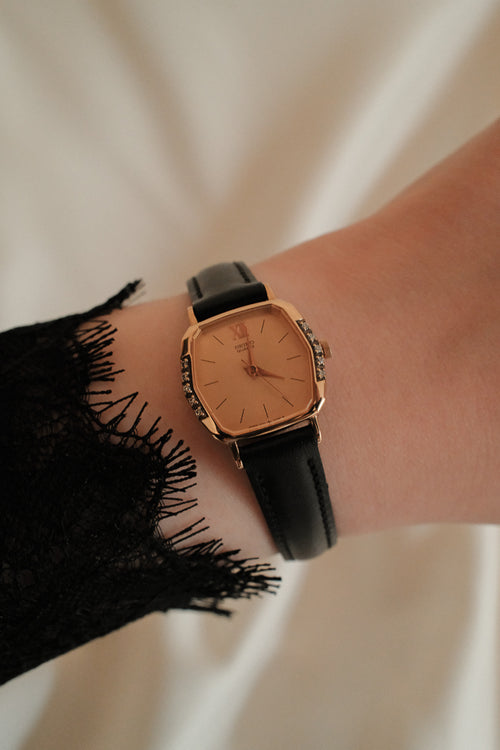 Vintage Seiko Ladies Gold Hexagonal Watch with Gemstones on Black Leather Strap
