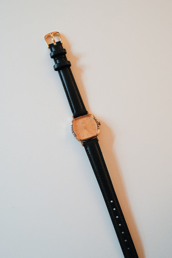 Vintage Seiko Ladies Gold Hexagonal Watch with Gemstones on Black Leather Strap