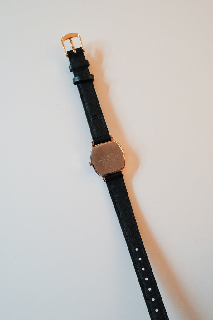 Vintage Seiko Ladies Gold Hexagonal Watch with Gemstones on Black Leather Strap
