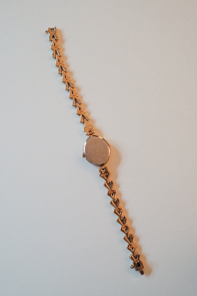 Vintage Alba Ladies Gold Watch with Red Gemstone