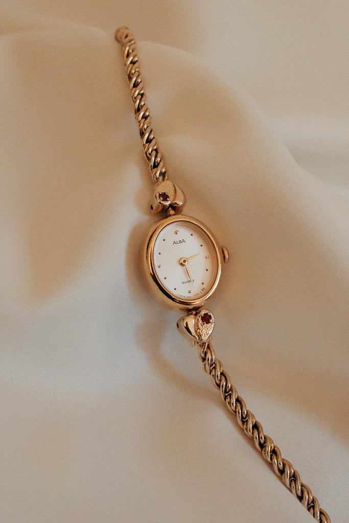 Vintage Alba Ladies Gold Heart Bracelet Watch with Red Gemstones