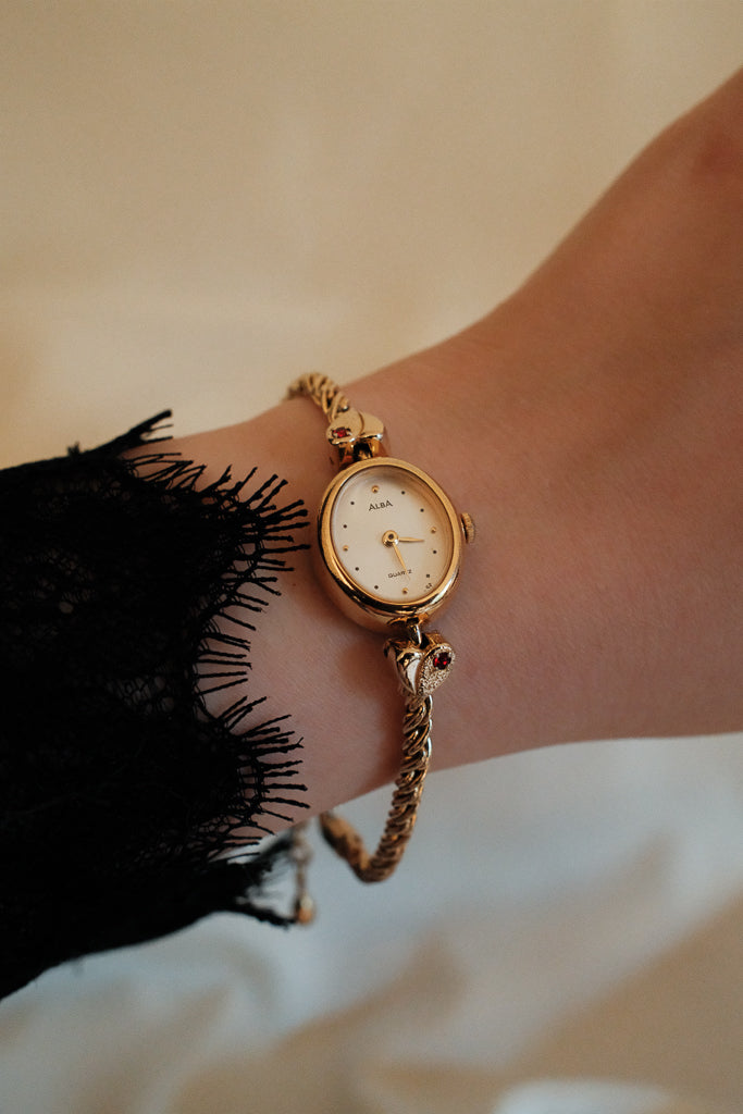 Vintage Alba Ladies Gold Heart Bracelet Watch with Red Gemstones
