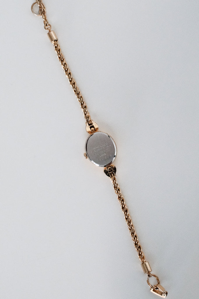 Vintage Alba Ladies Gold Heart Bracelet Watch with Red Gemstones