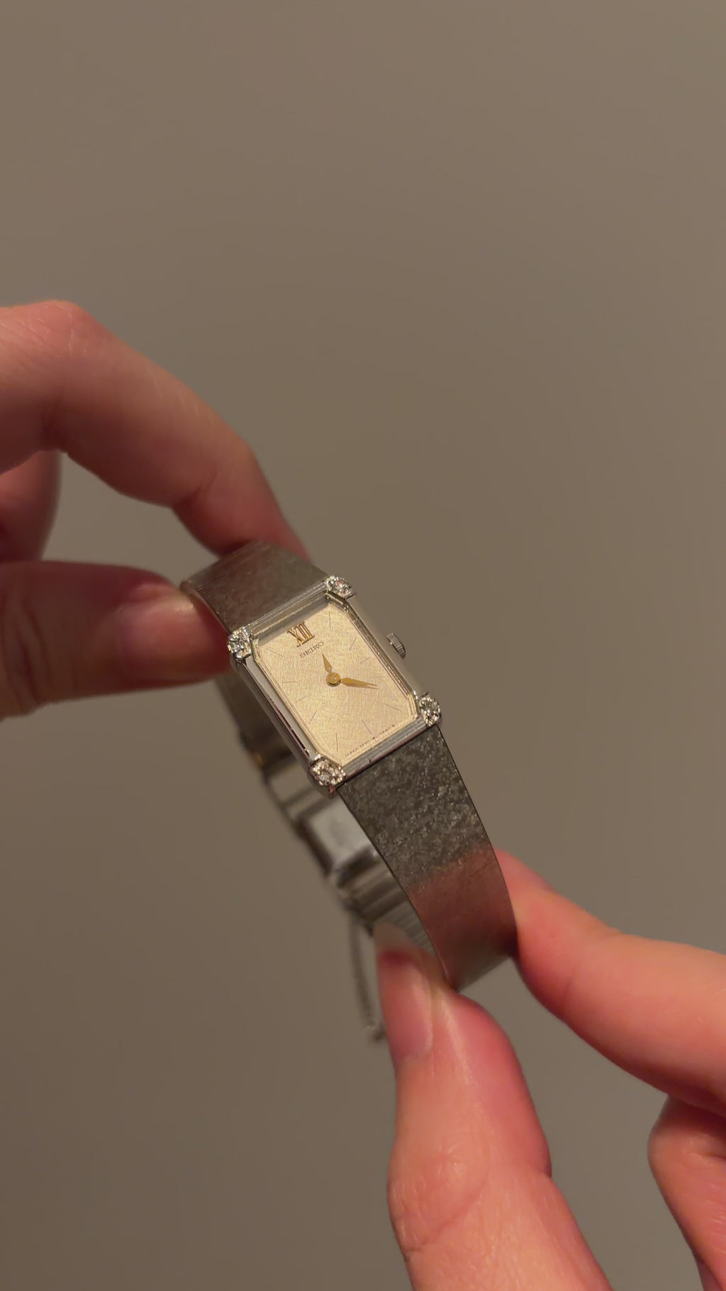 Vintage Seiko Ladies Silver Watch with Gold Hands and Gems on Bezel
