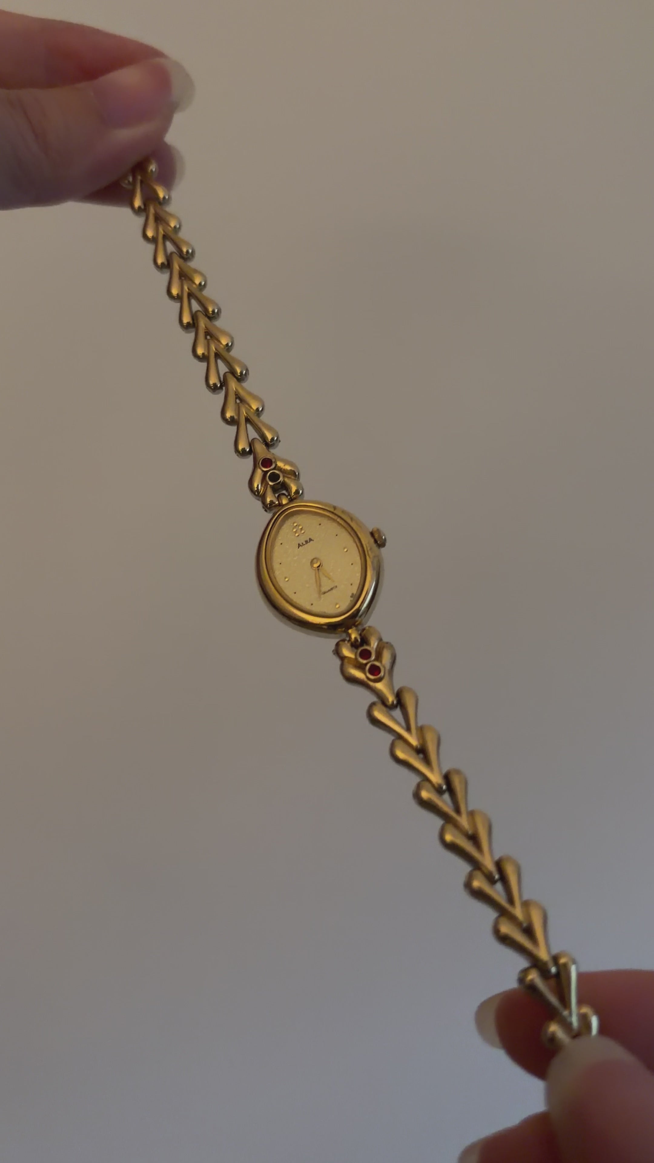 Vintage Alba Ladies Gold Watch with Red Gemstone