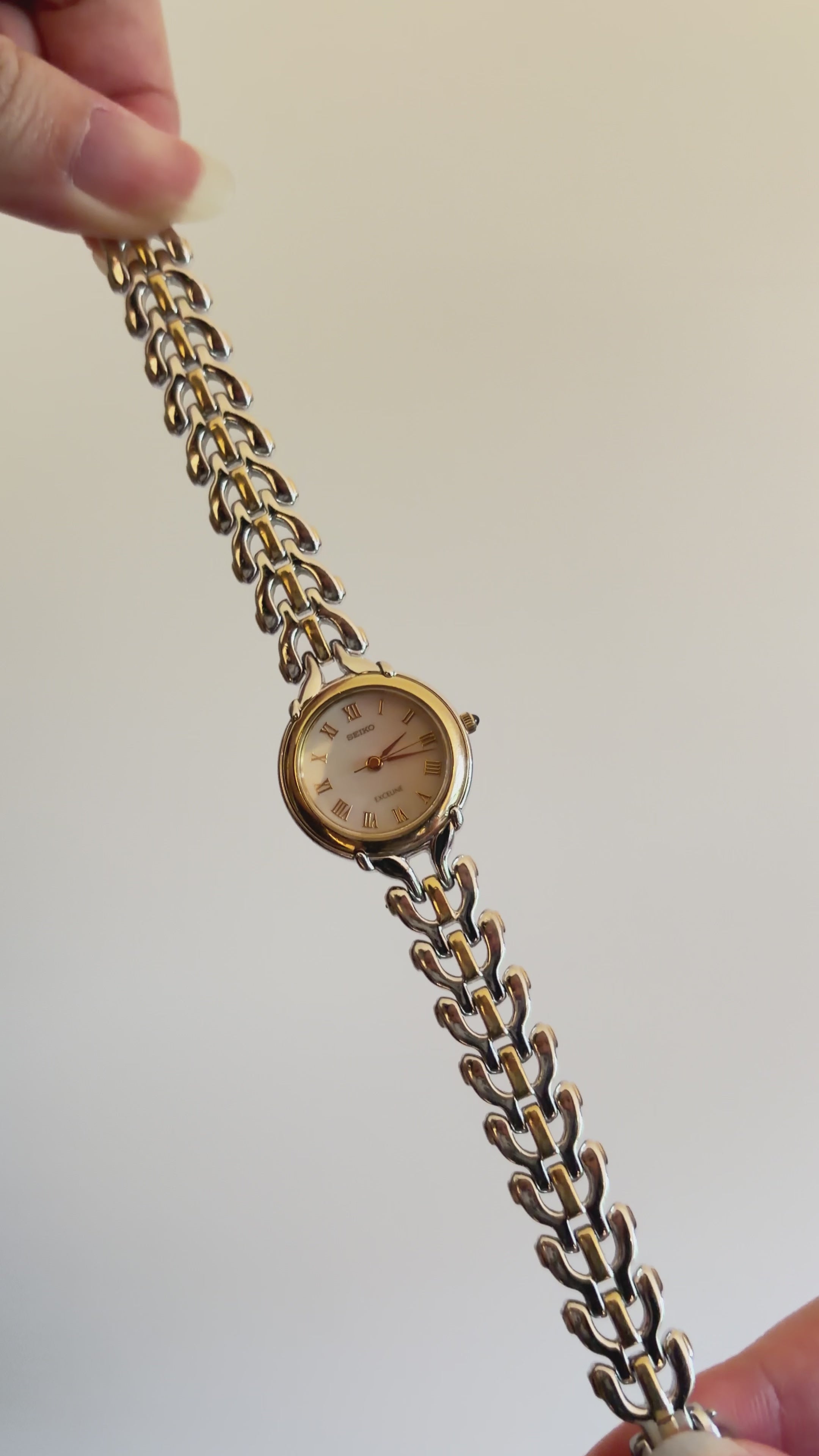 Vintage Seiko Exceline Ladies Silver Watch with Pearlescent Ivory Dial and Gold Accents